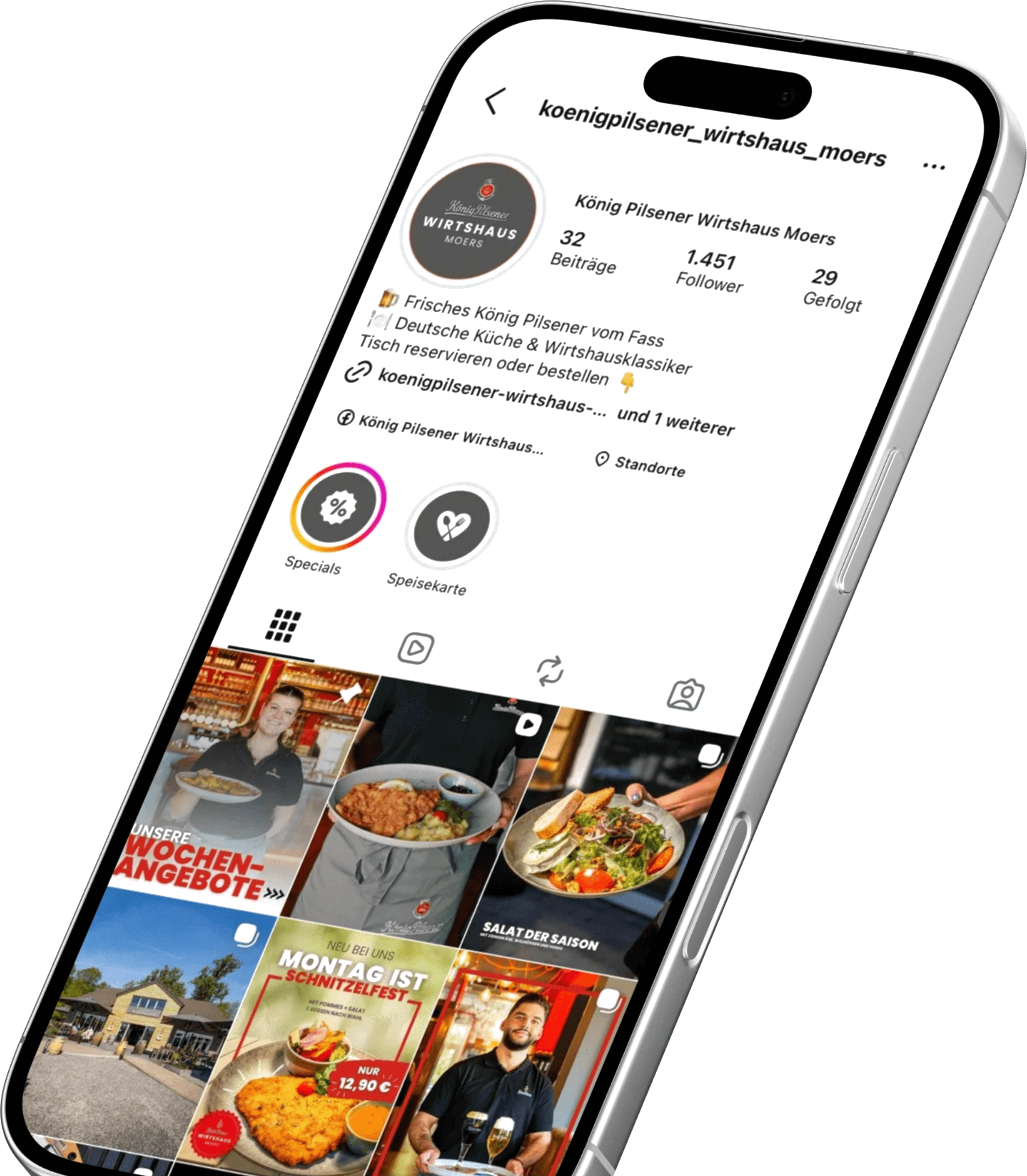 Smartphone mit dem gestalteten Instagram-Profil des König Pilsener Wirtshaus Moers